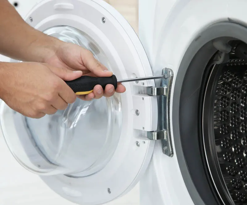 Technician fixing dryer emergency repair Toronto same day